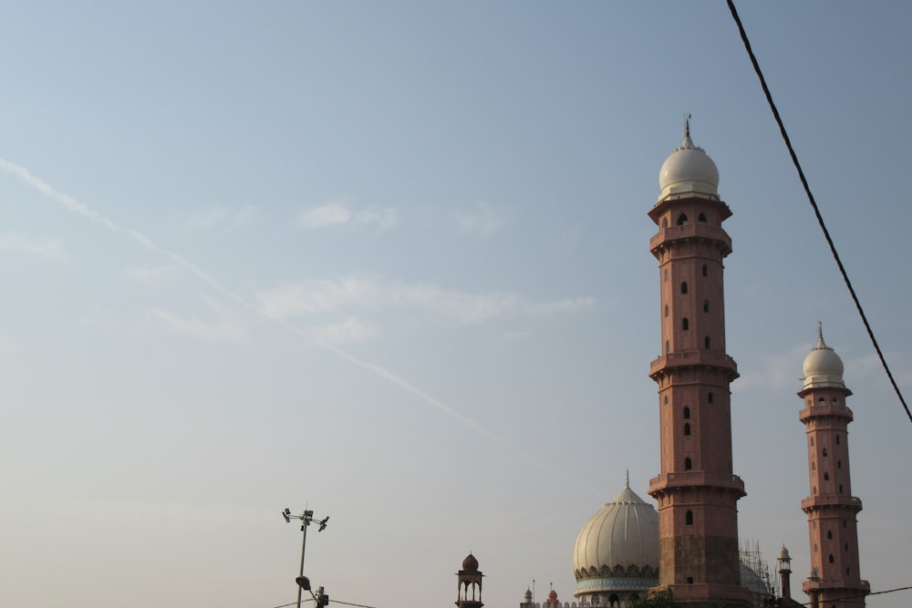 white and gold dome building under blue sky during daytime