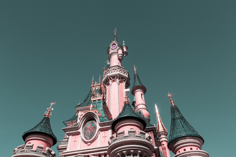 blue and brown concrete castle under blue sky during daytime