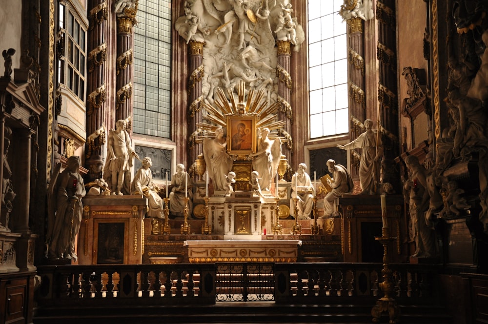 gold statue on brown wooden table