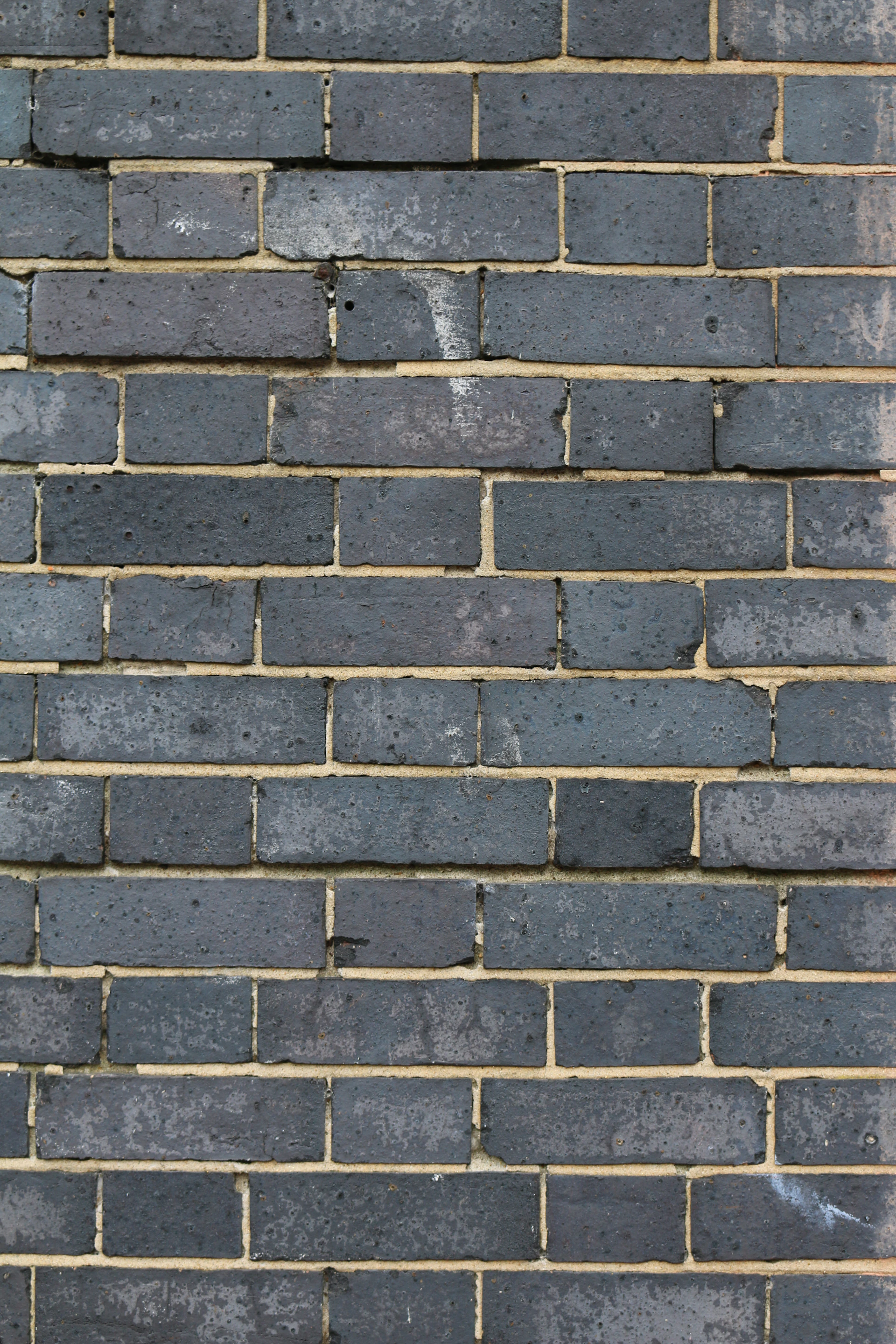 brown and gray brick wall