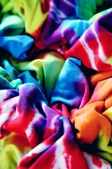 yellow purple and blue textile