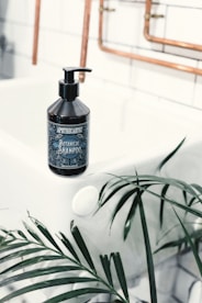 black and white plastic pump bottle