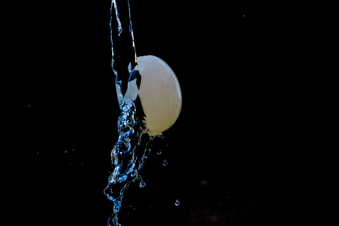 water drop on black surface