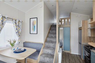 blue ceramic plate on brown wooden table