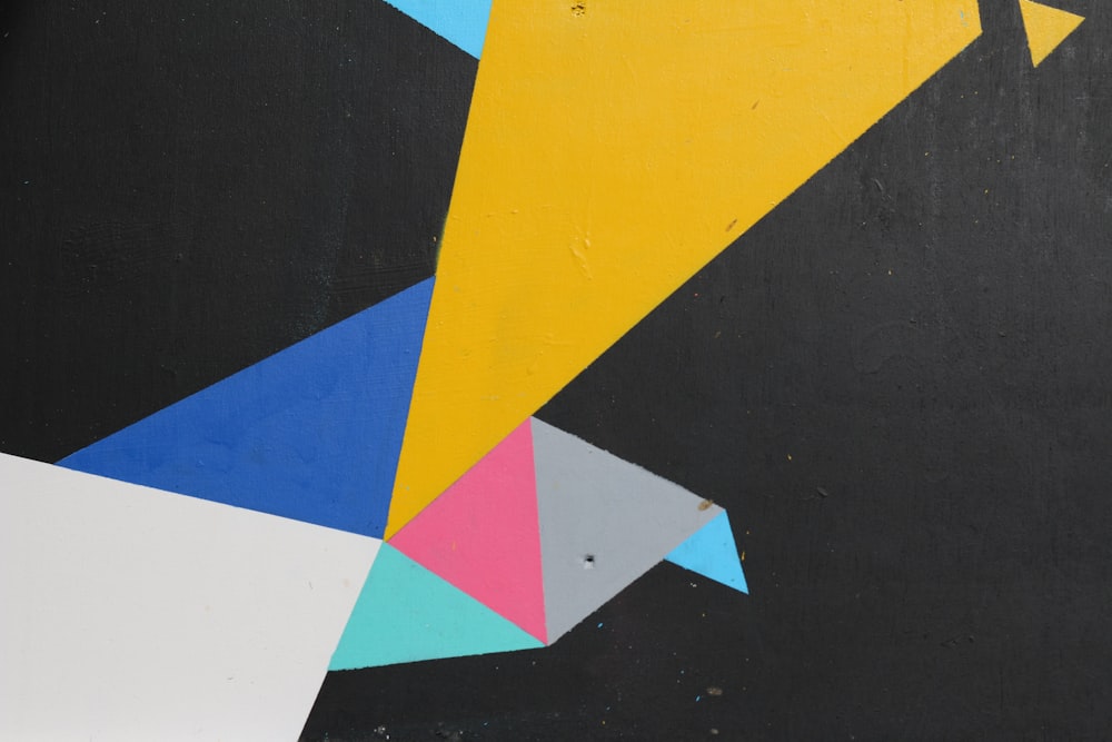 yellow blue and black triangle illustration