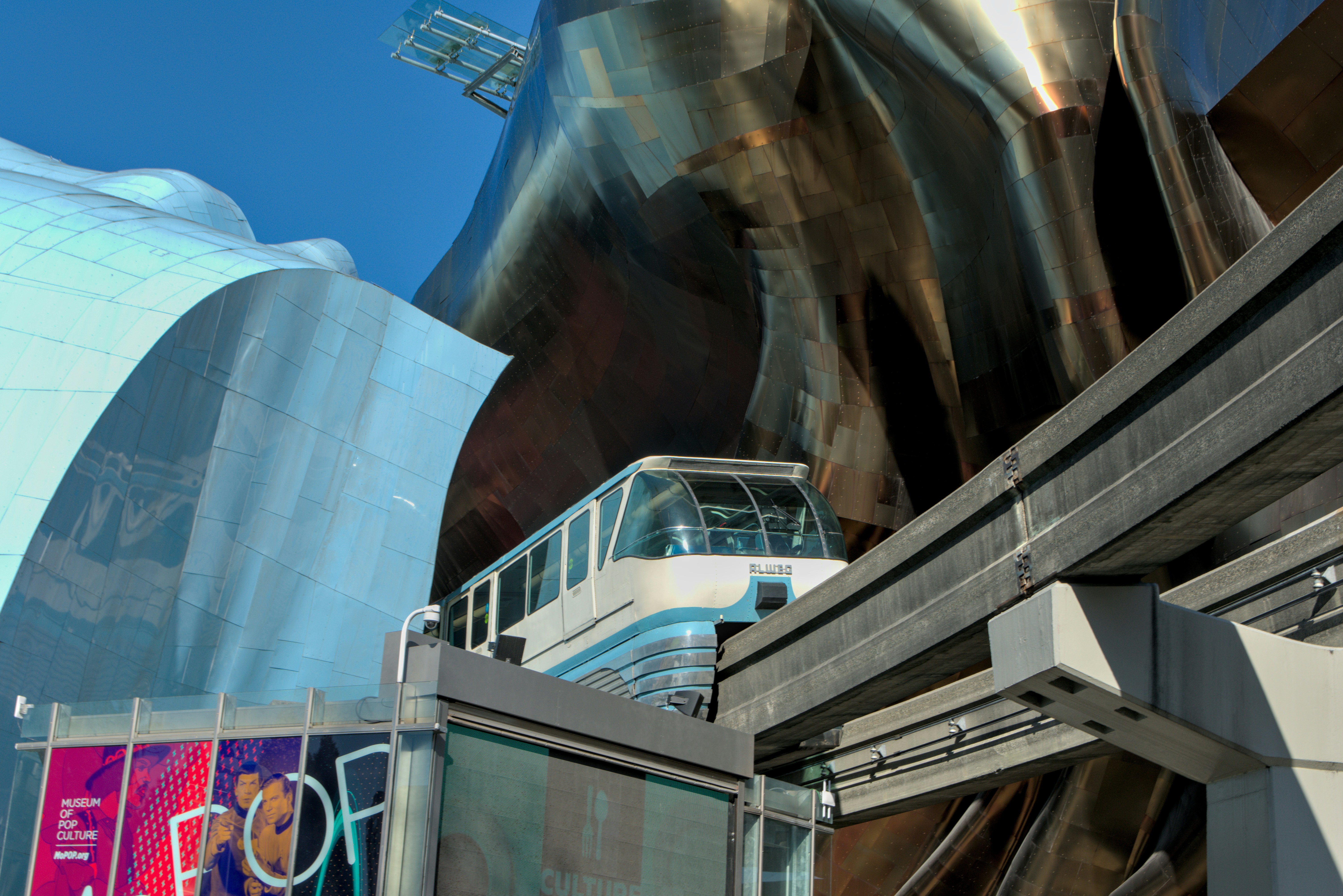 white and blue building under blue sky during daytime