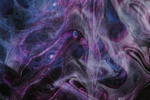 Abstract cosmic patterns in deep blues and purples, evoking the mystery of the akashic records.