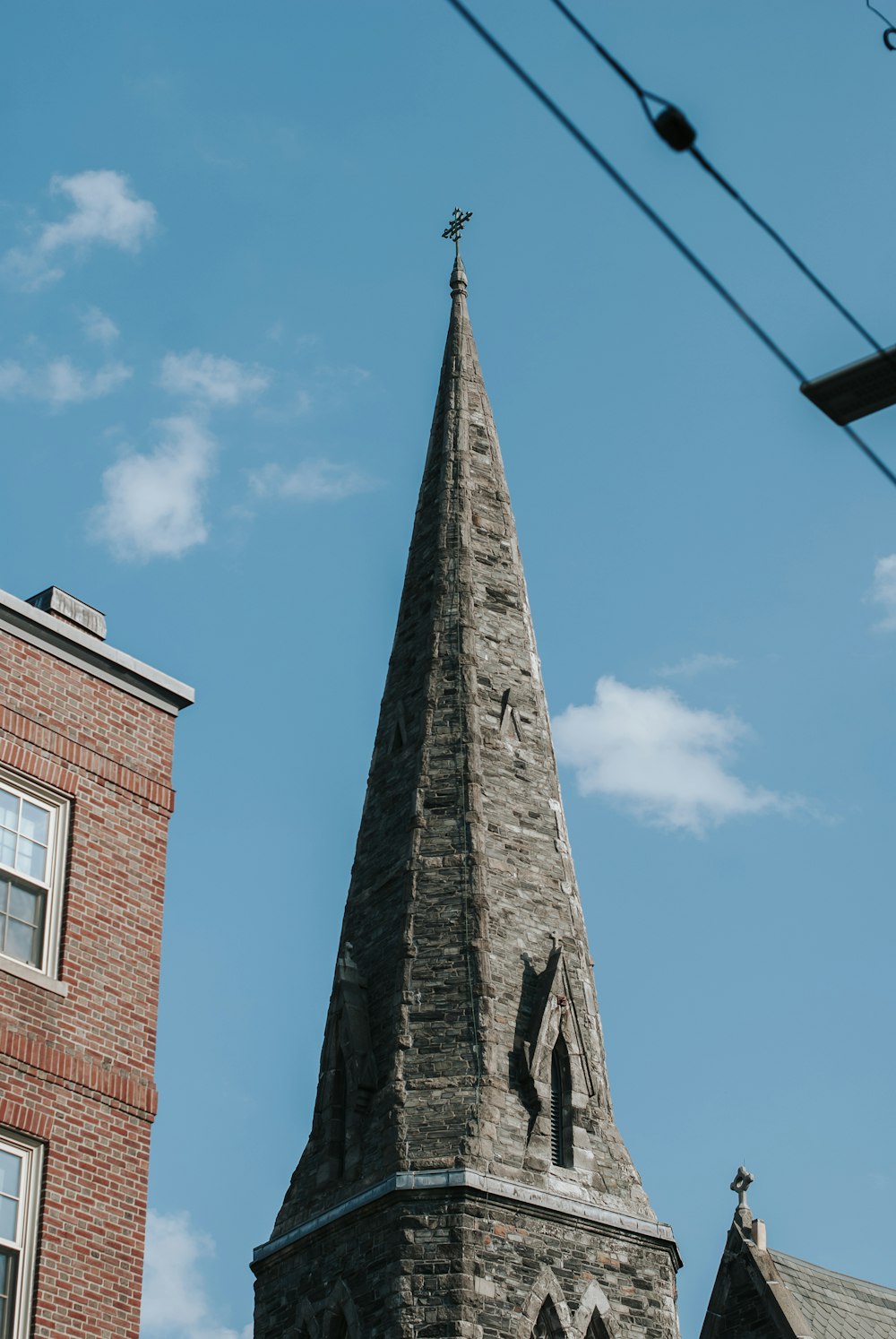 brown brick building under blue sky during daytime