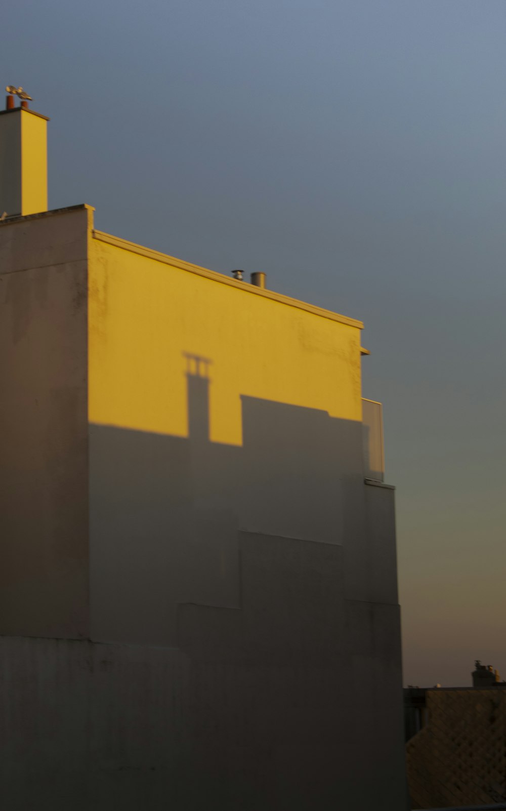 brown concrete building under blue sky during daytime