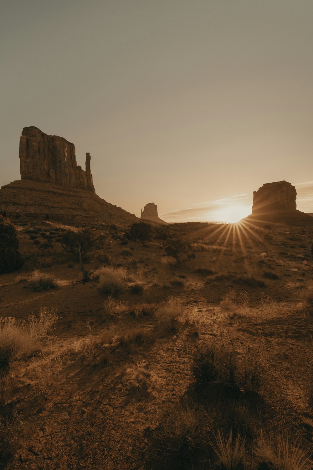 brown rock formation under white sky during daytime