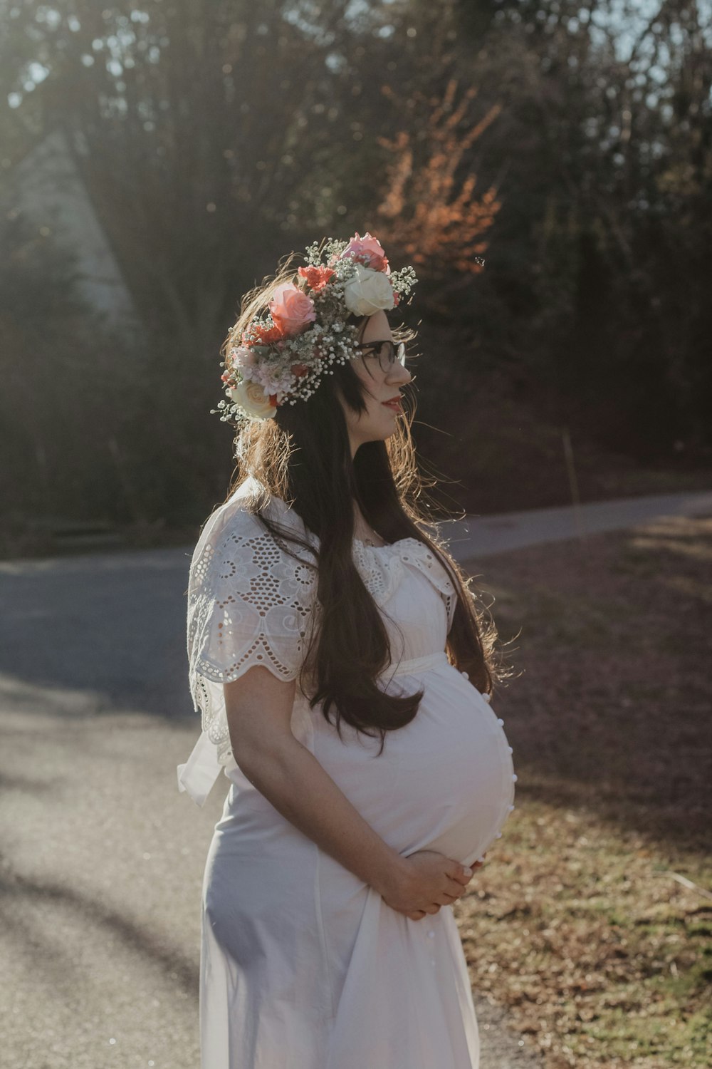 woman in white shirt with floral headdress