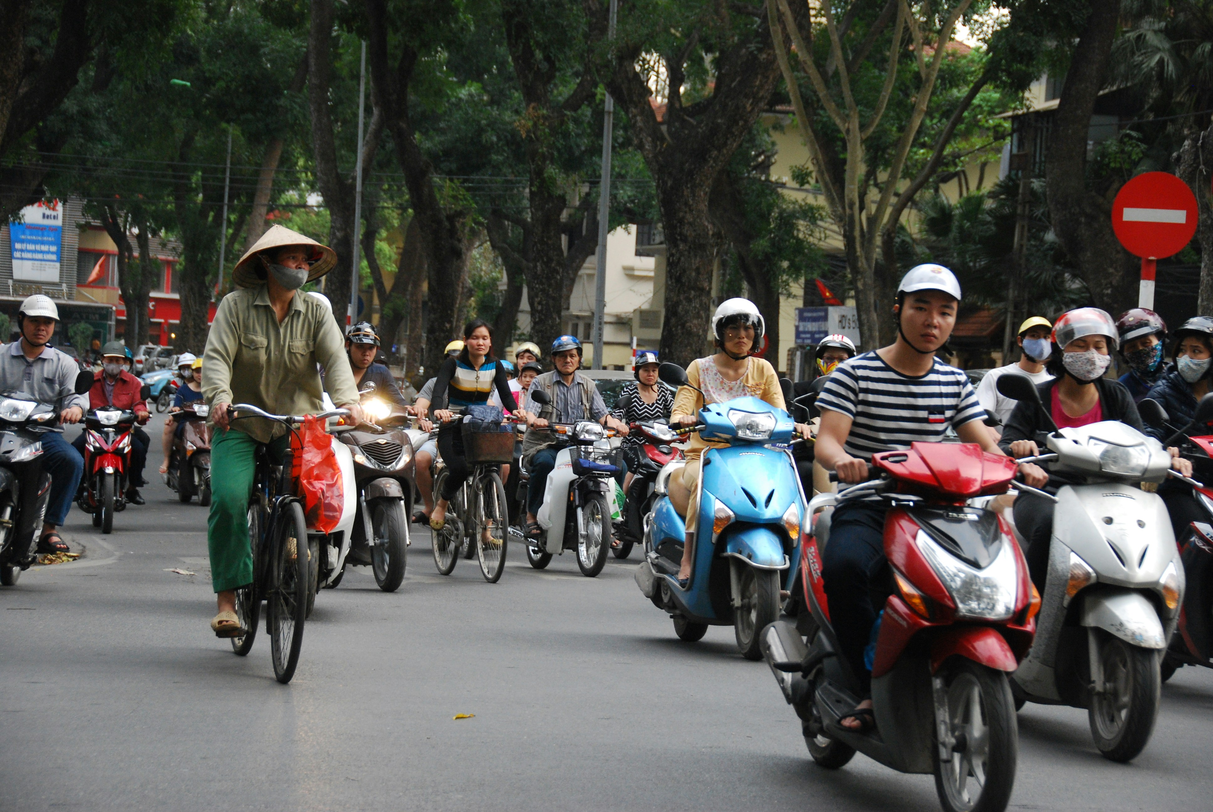 people riding on motorcycle during daytime