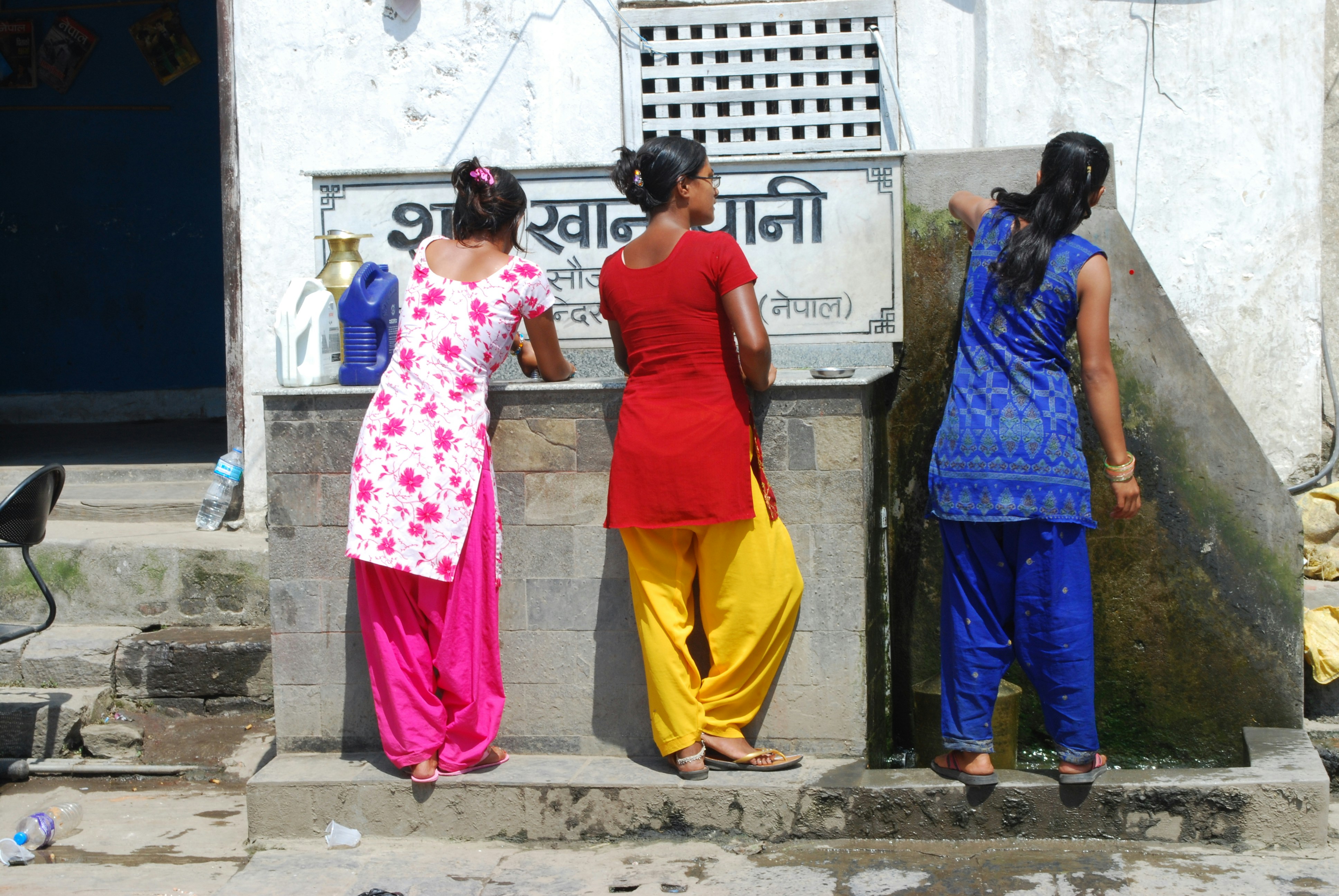 Women in blue and pink