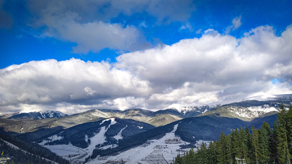 snow covered mountain under blue sky during daytime