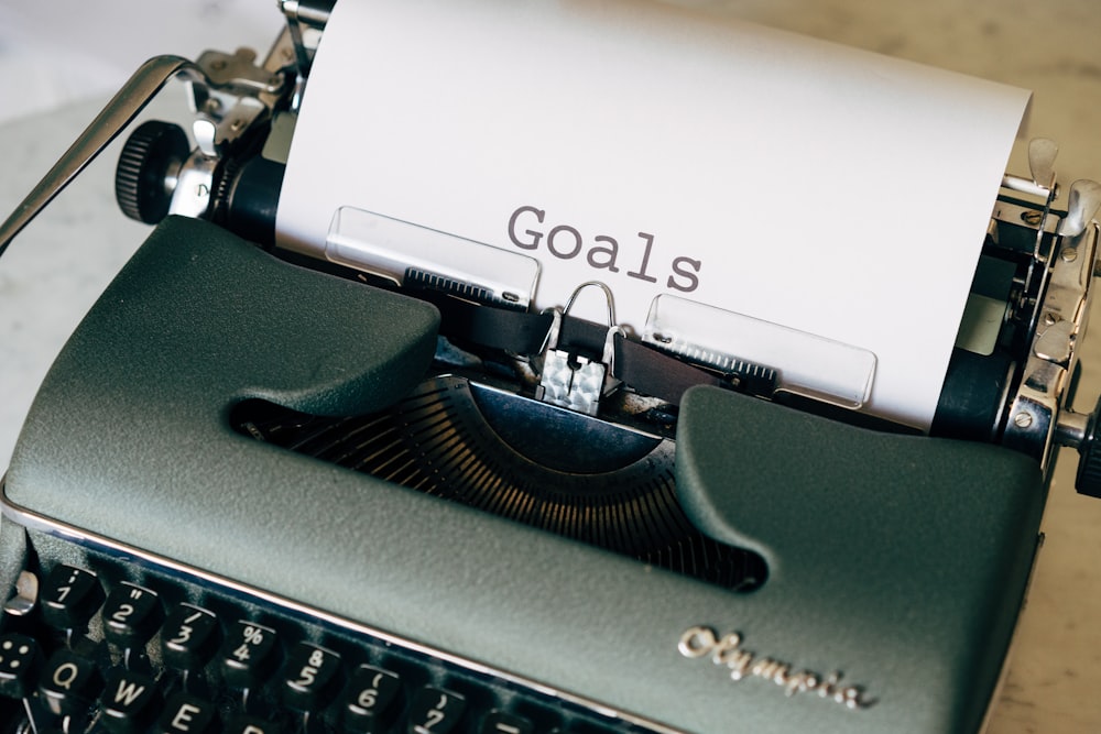 black and white typewriter on green textile - Springtime Fitness Tips