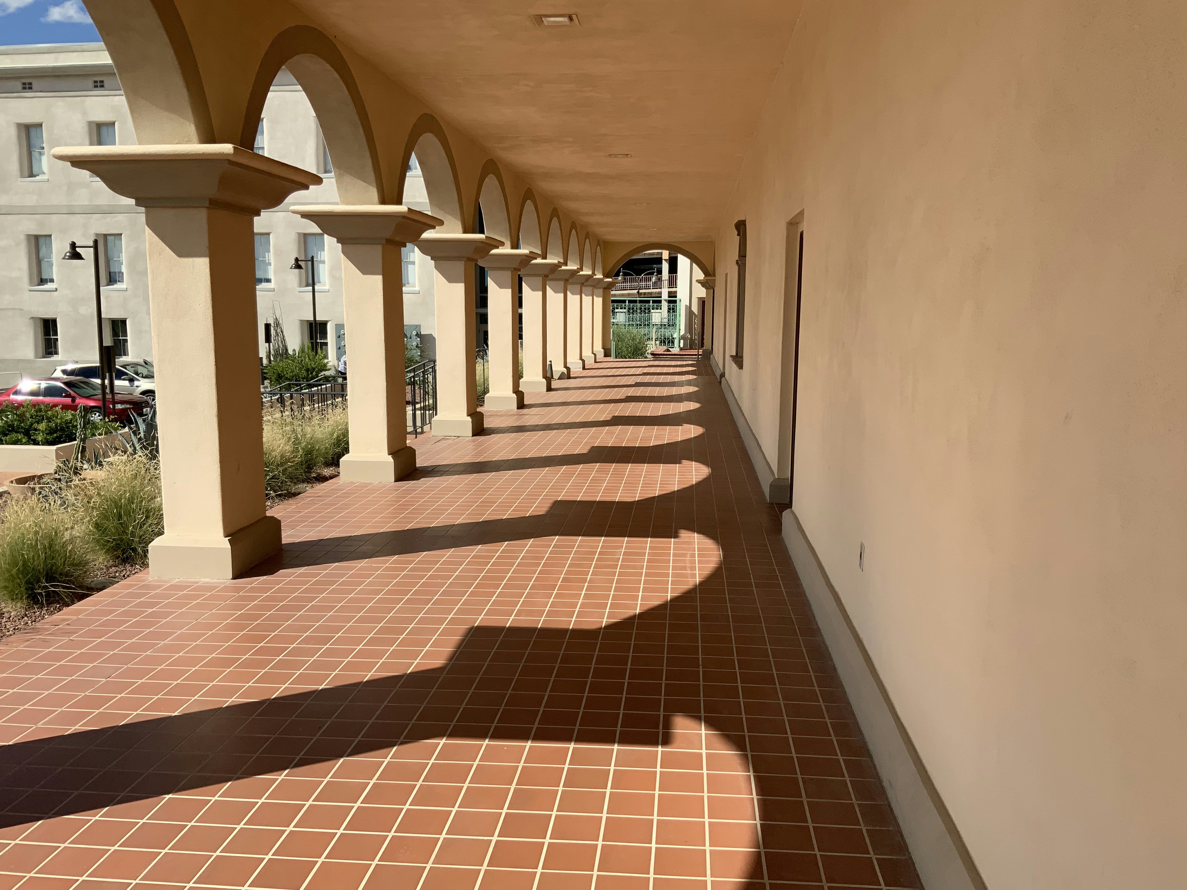 a row of arches on the side of a building