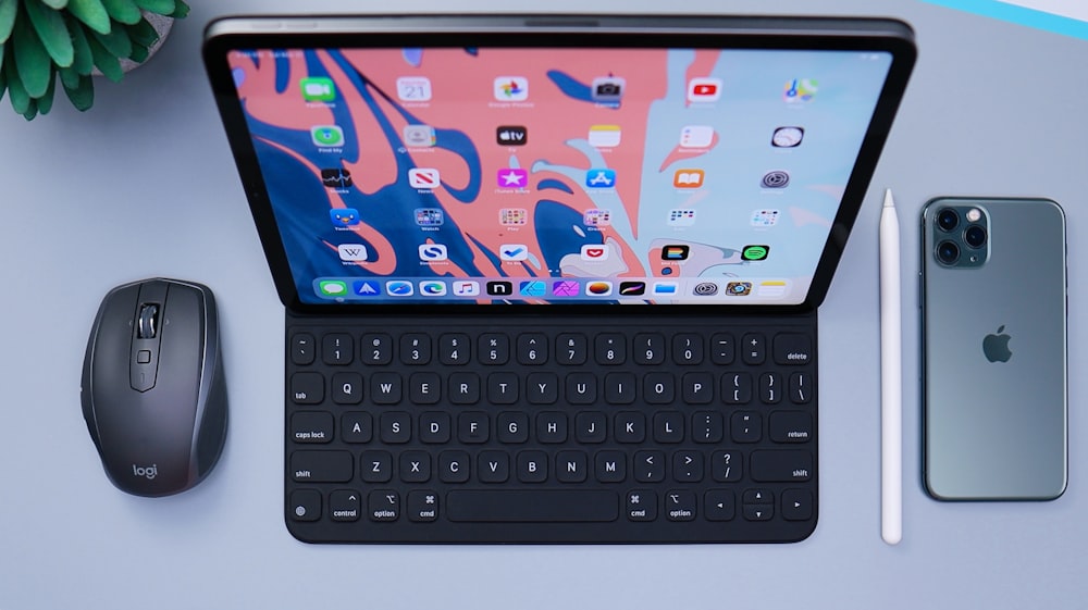 black tablet computer with keyboard