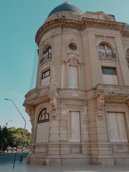 beige concrete building under blue sky during daytime in Santa Fe Argentina