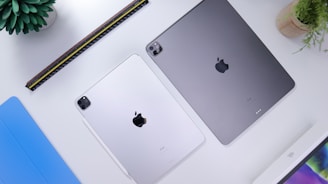 silver ipad on white table