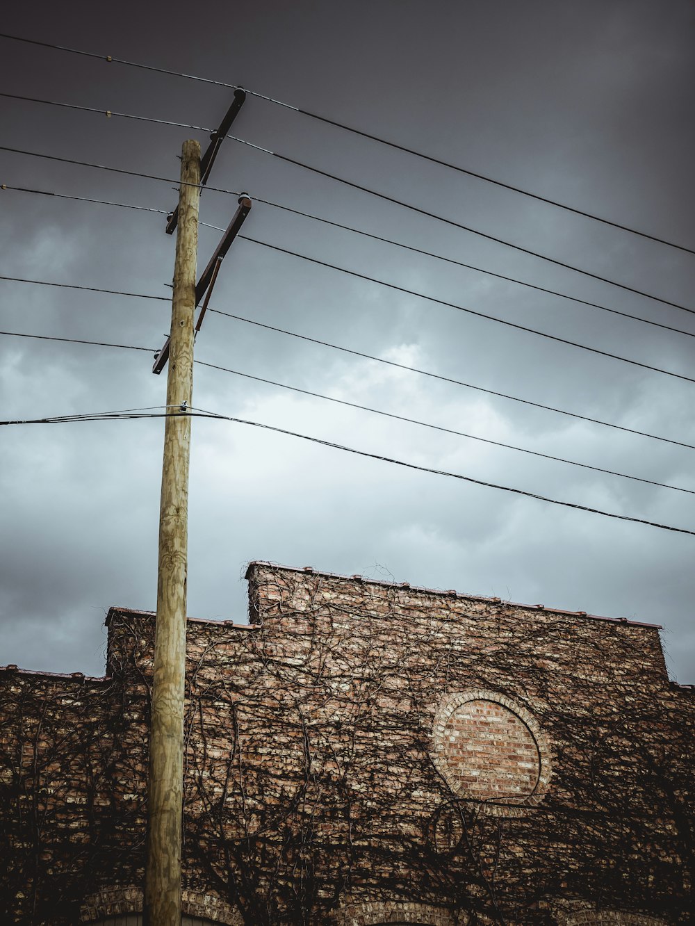 brown brick wall under blue sky during daytime