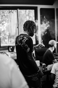 grayscale photo of man in black t-shirt