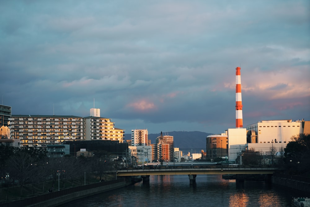 city skyline under cloudy sky during daytime