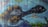 A colorful mural featuring a fantastical creature with a turtle-like shell and a long neck. The creature has large, expressive eyes and is set against an abstract underwater background. Bright colors and imaginative elements are evident throughout the artwork.