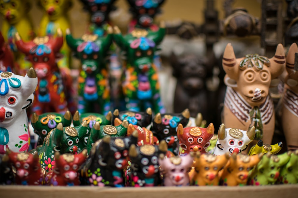 selective focus photography of hindu deity figurine