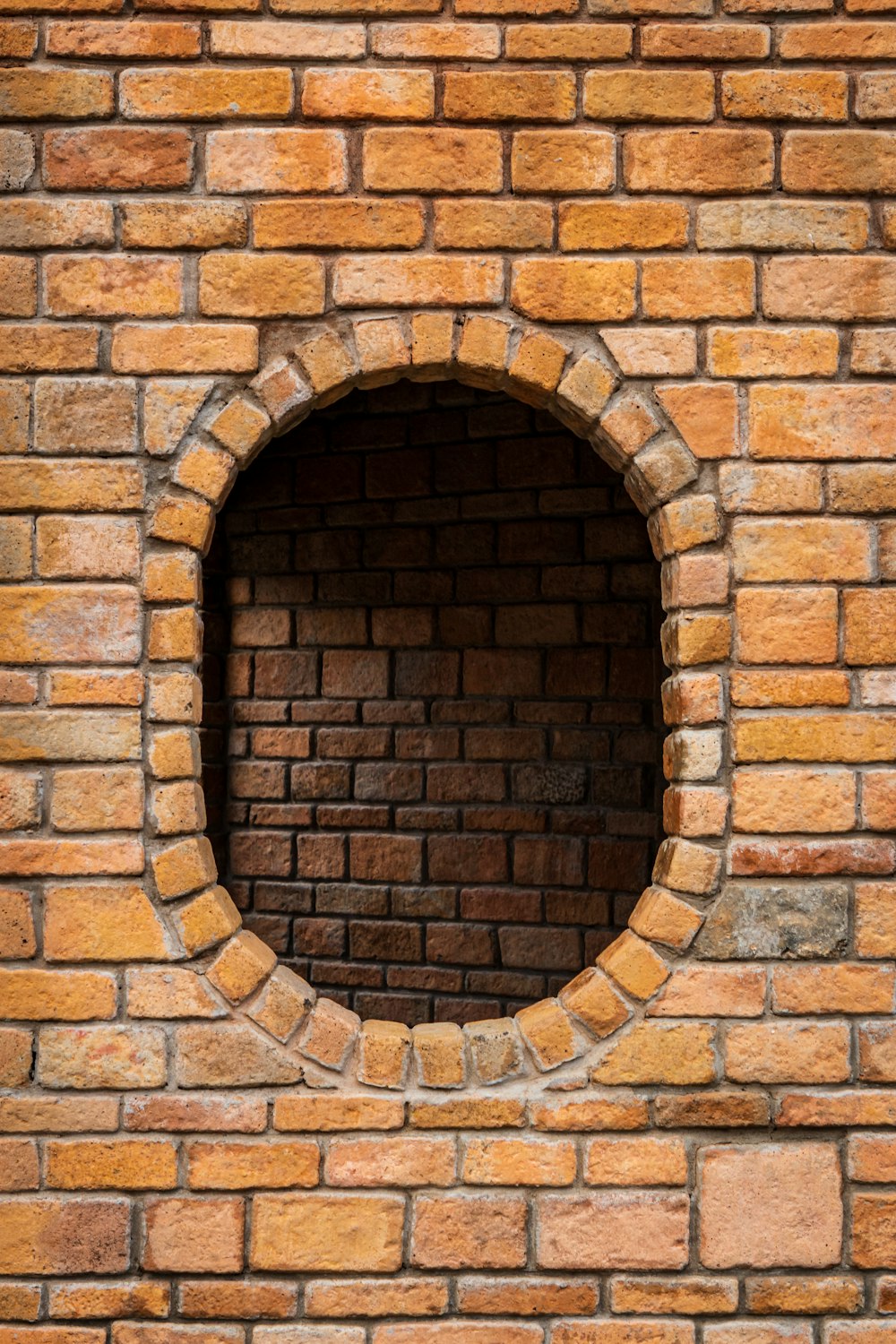 brown brick wall with brown brick wall