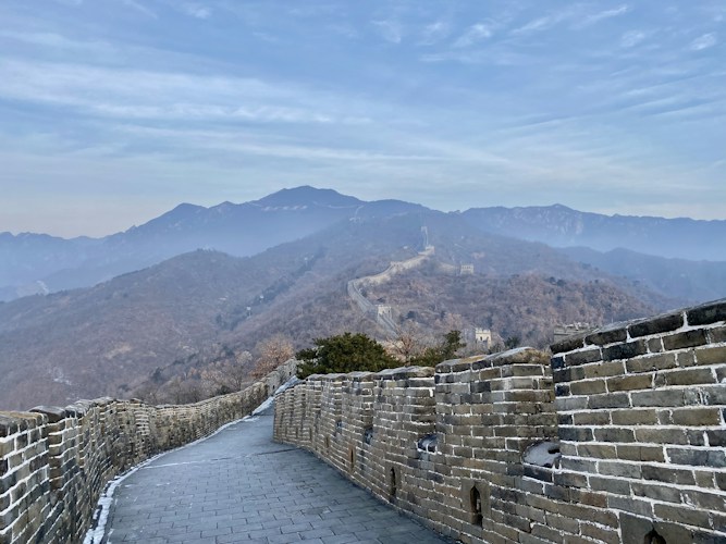 Great Wall of China stretching across mountainous terrain showing its enormous length