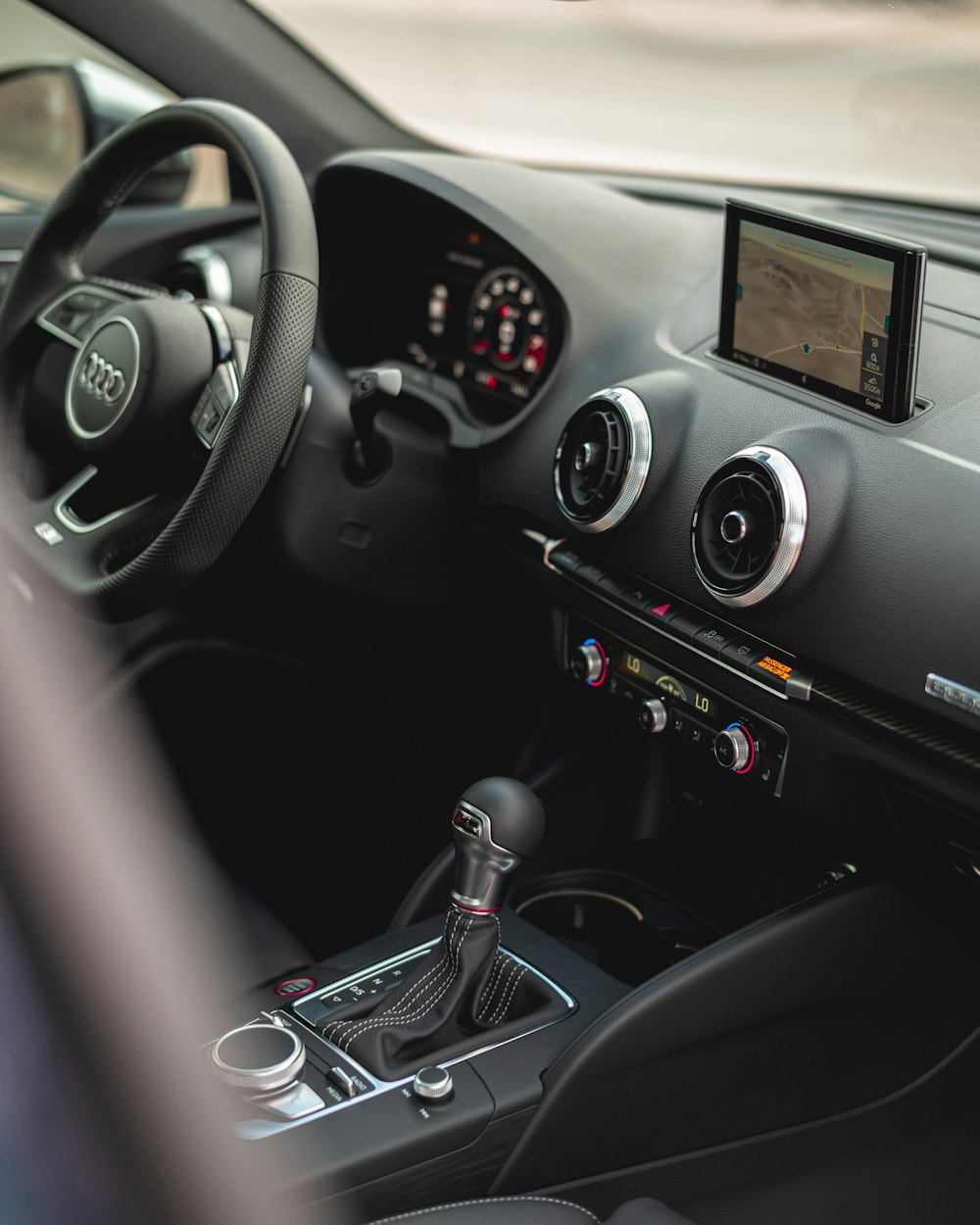 black and silver mercedes benz steering wheel