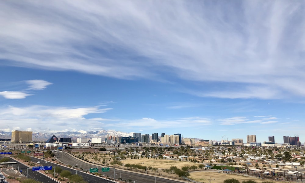 city buildings under blue sky during daytime