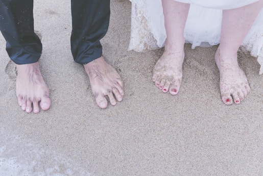man and woman holding hands