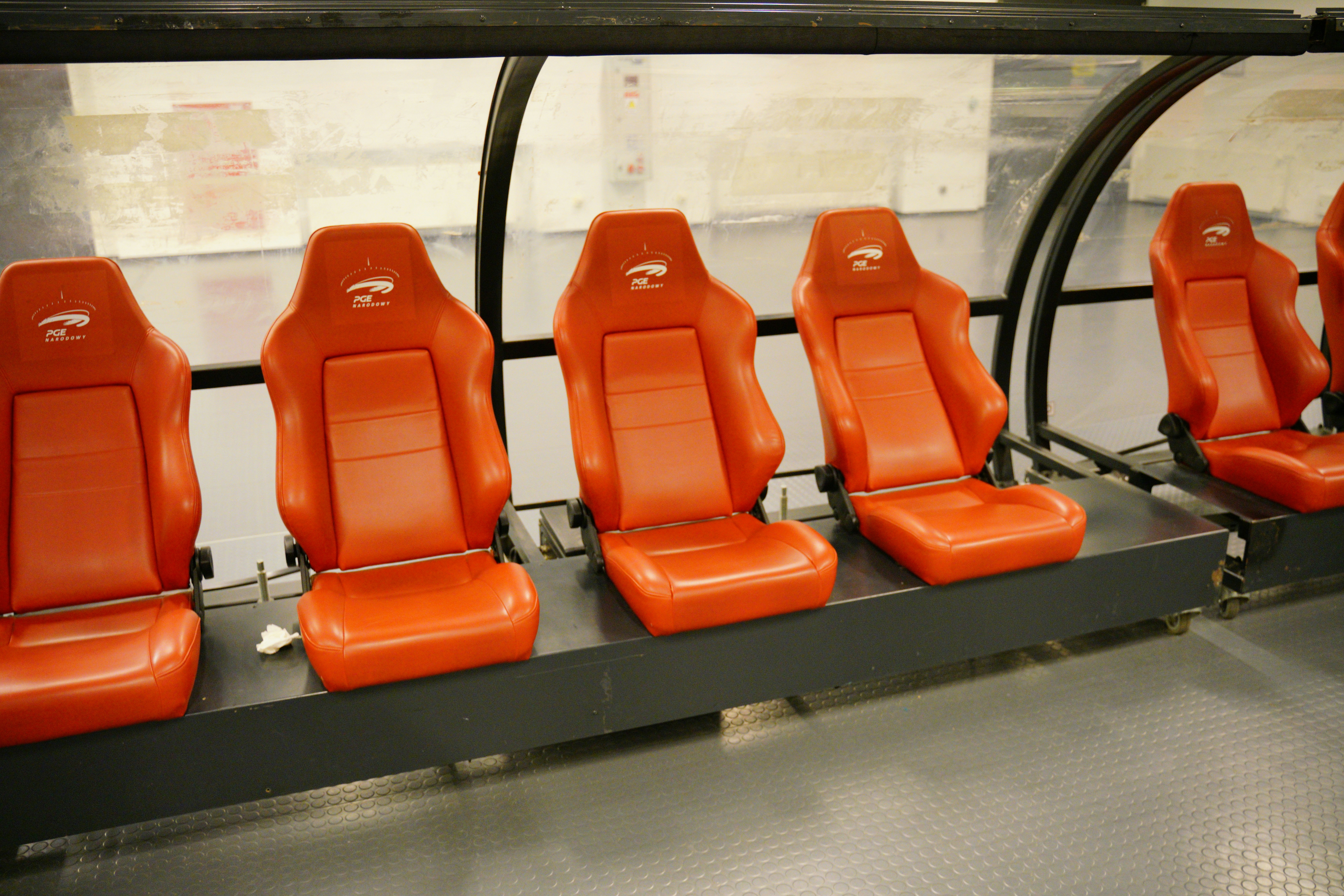 Spacious three-row electric SUV interior with captain’s chairs and flat floor