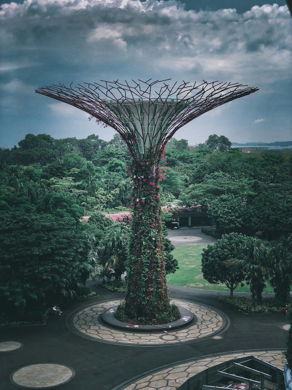 green trees under cloudy sky during daytime