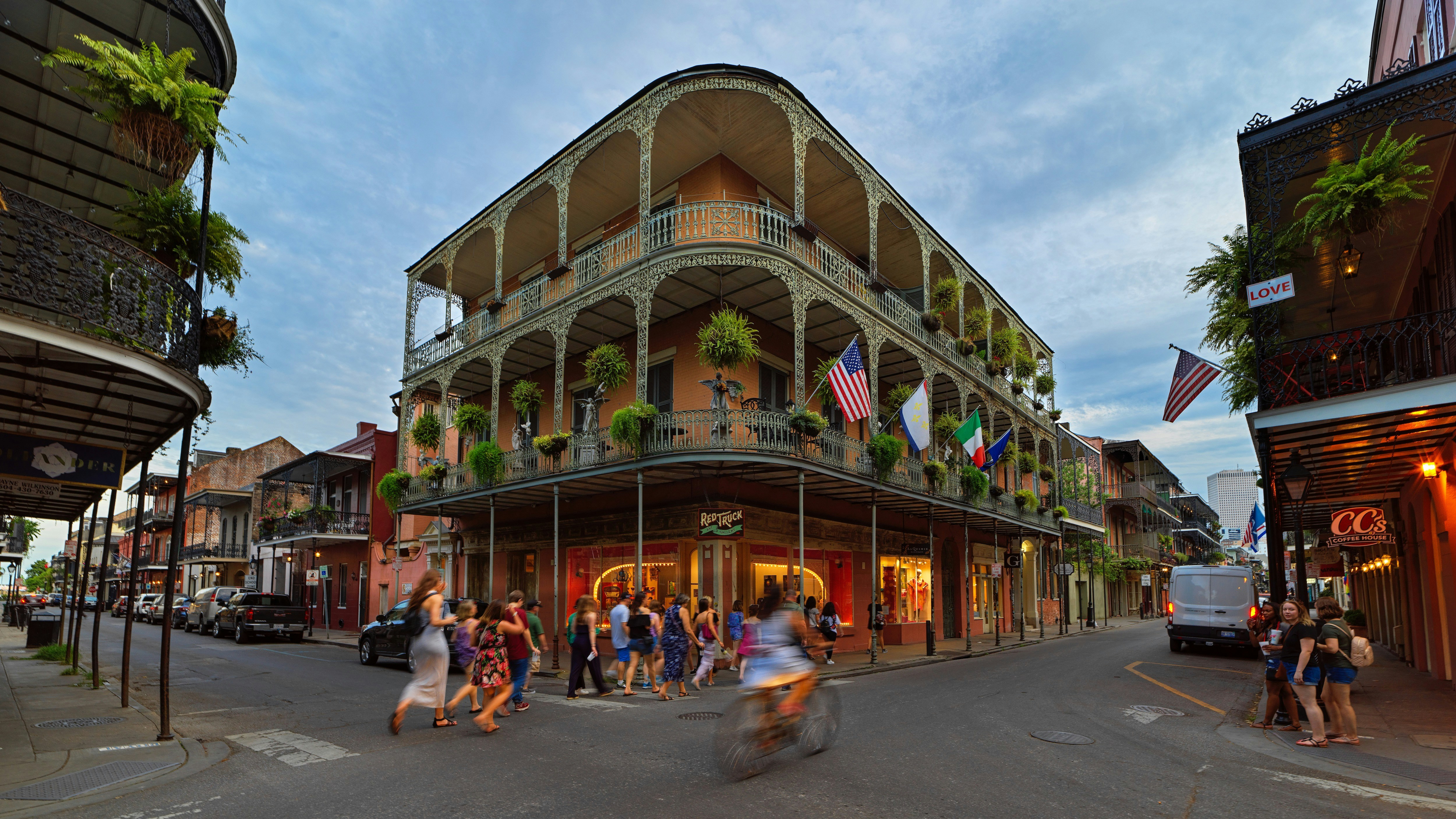 people walking on street near brown building during daytime