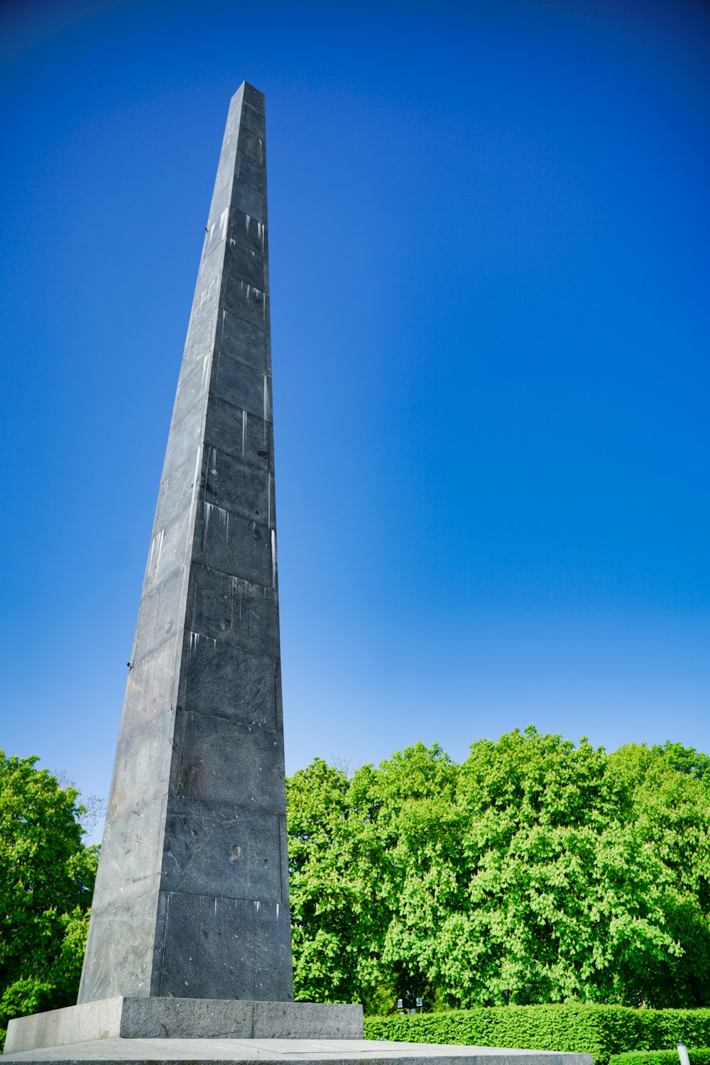 gray concrete tower under blue sky during daytime