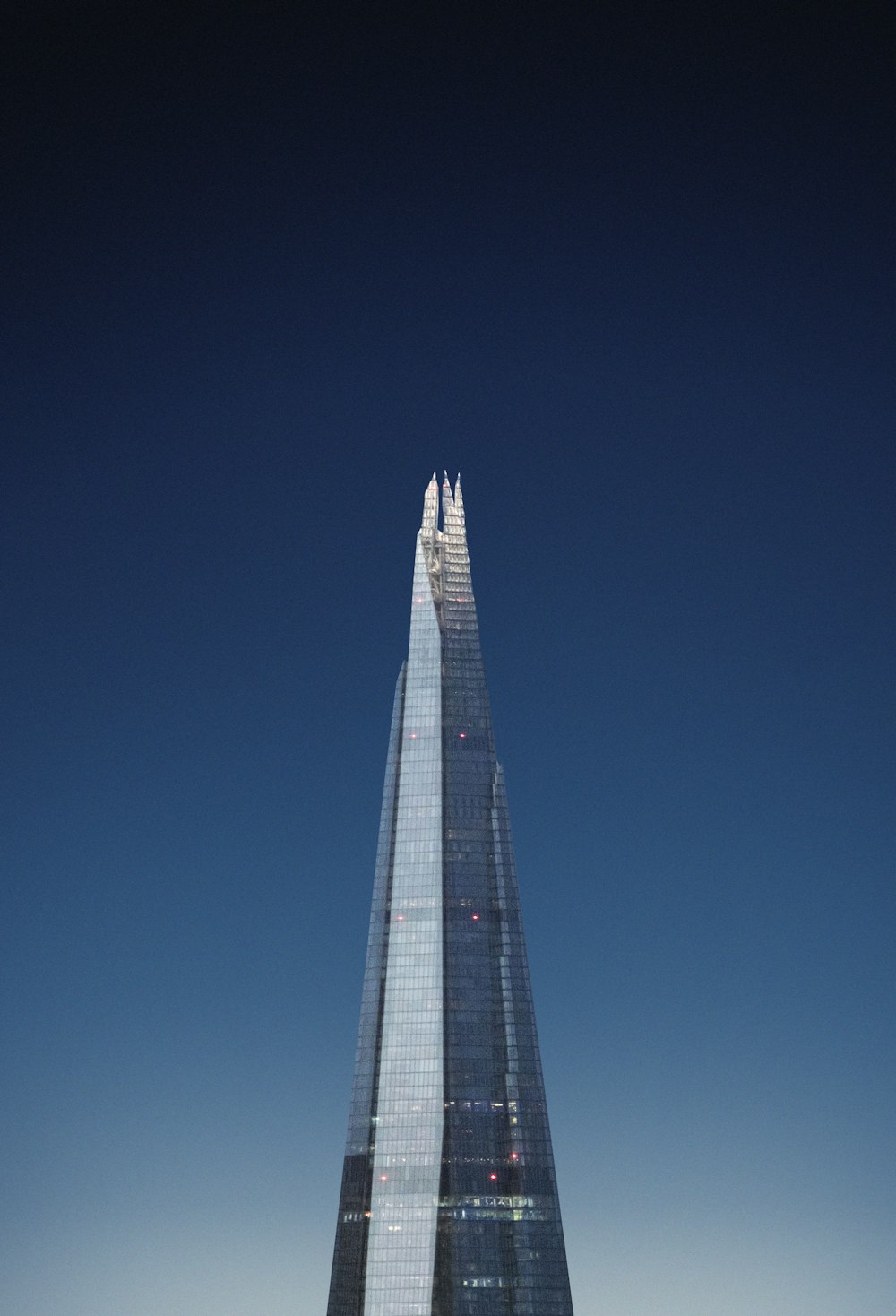 gray and blue high rise building under blue sky during daytime