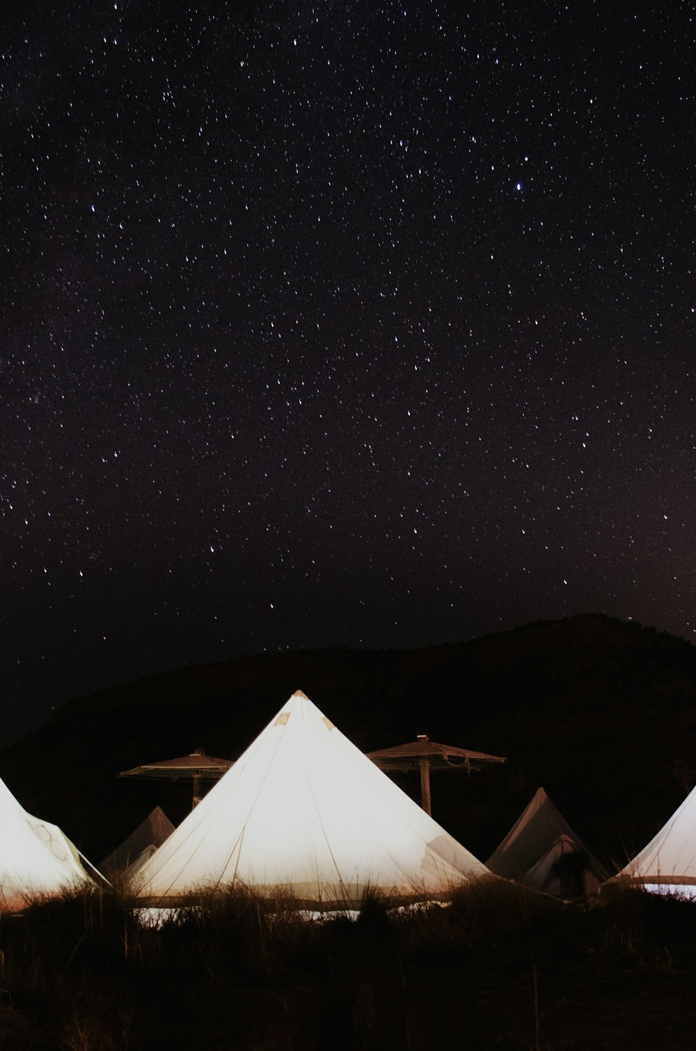 white tent under starry night