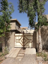 Finished custom metal gate installed at a residential property in Madera.