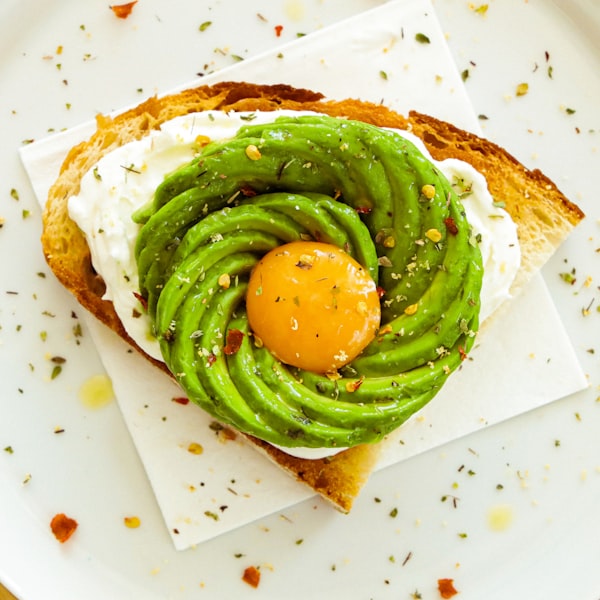 Smashed avocado toast with fried egg