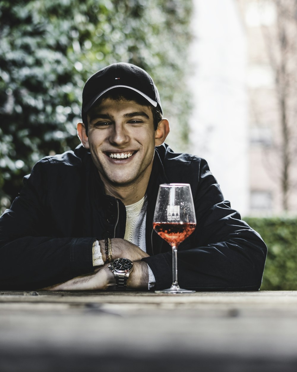 smiling woman holding wine glass