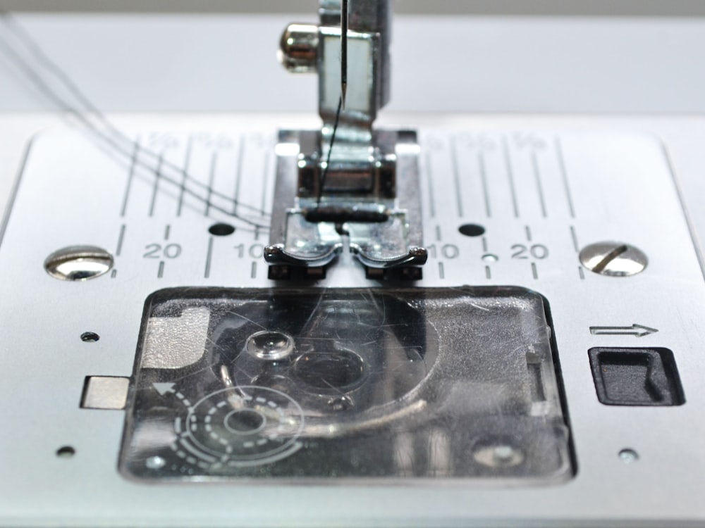 white and black sewing machine