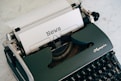 a close up of an old fashioned typewriter