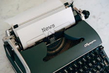 a close up of an old fashioned typewriter