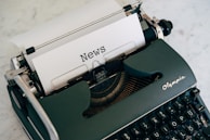 a close up of an old fashioned typewriter