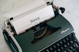 a close up of an old fashioned typewriter
