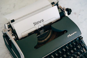a close up of an old fashioned typewriter