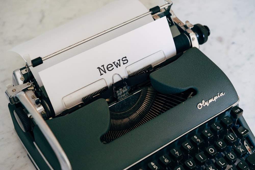 a close up of an old fashioned typewriter