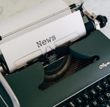 a close up of an old fashioned typewriter